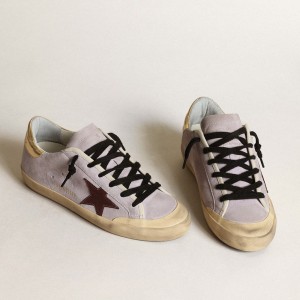 Golden Goose Super-Star Sneakers In Lilac Suede With A Brown Star And Gold Heel Tab GWF00107.F003421.45381