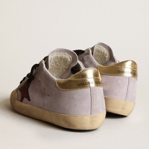 Golden Goose Super-Star Sneakers In Lilac Suede With A Brown Star And Gold Heel Tab GWF00107.F003421.45381